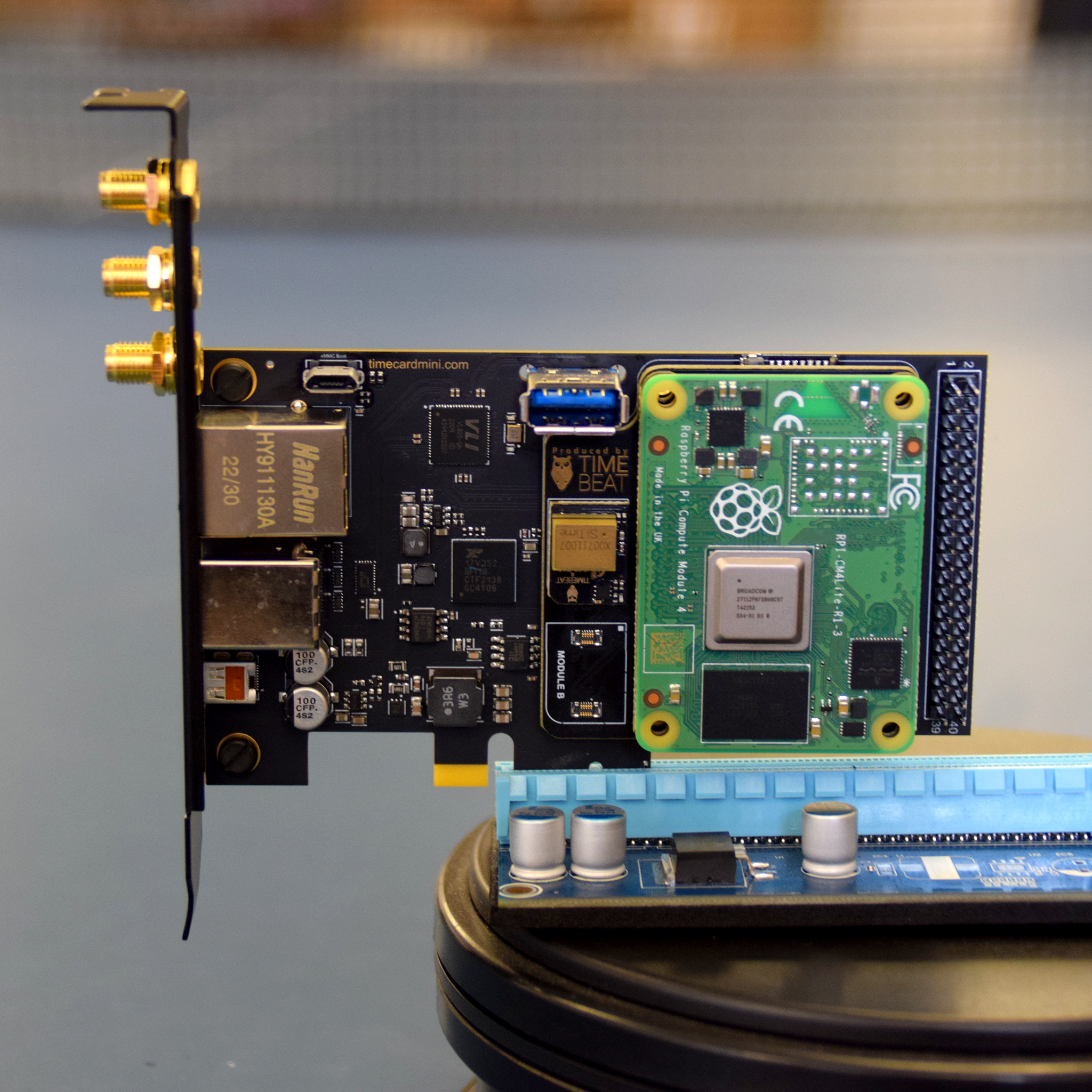 Timecard mini with Raspberry Pi CM4 including SiTime SiT5721 MEMS oscillator and AI Smart sensor.